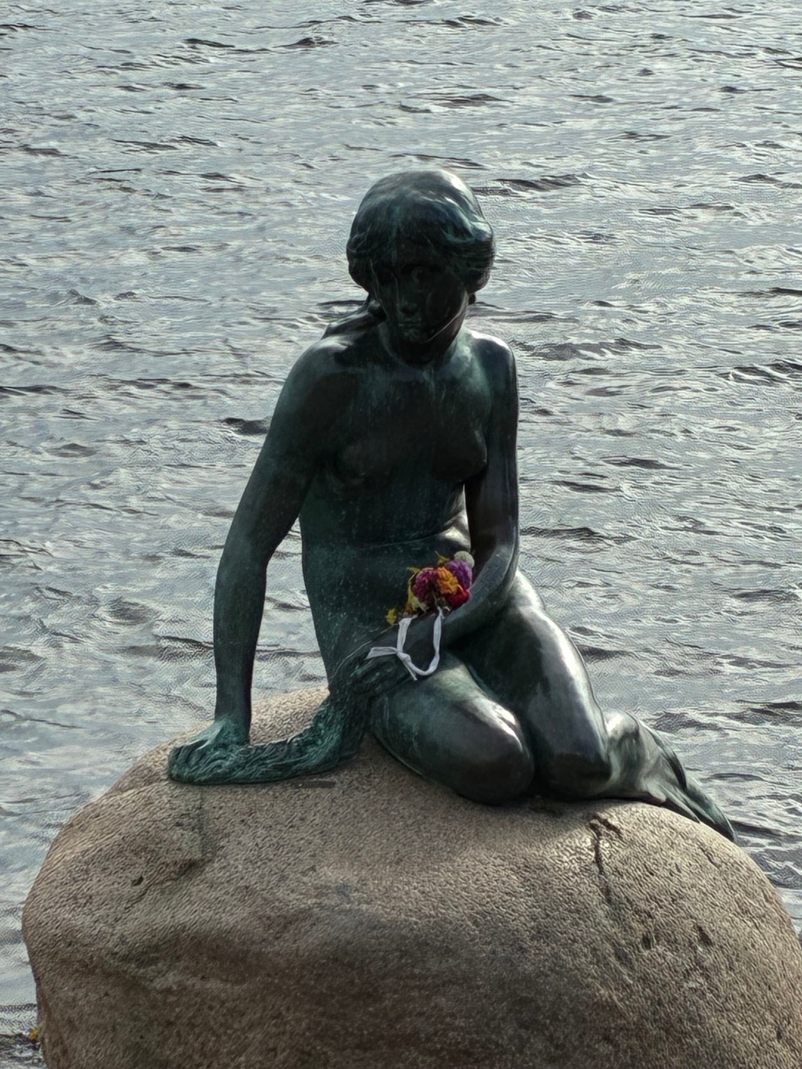 The Little Mermaid statue in Copenhagen, a landmark visited on the guided bicycle tour